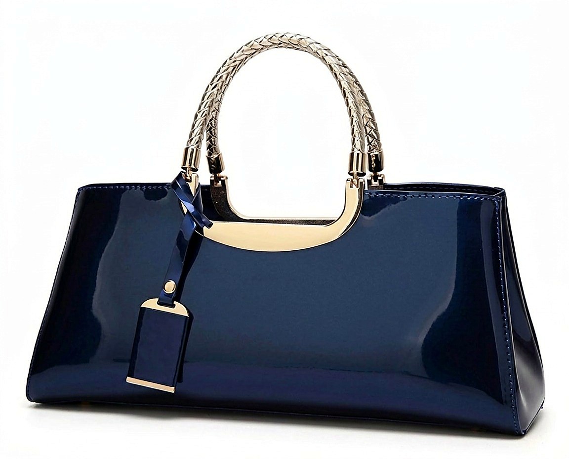 Nocturne Patent Clutch in navy high-gloss plant patent with a sculpted metal handle