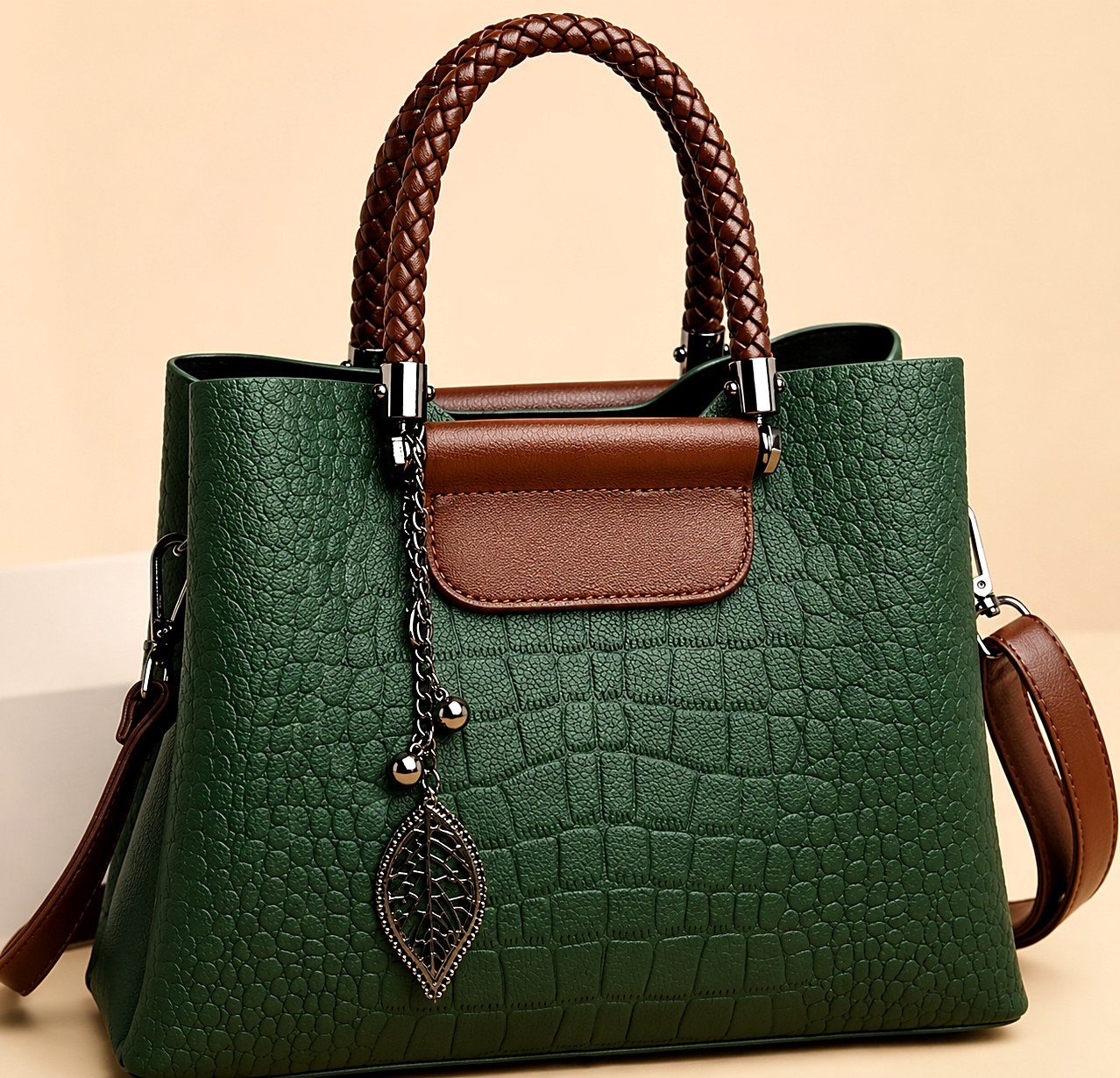 Forêt Braided Tote in croco-embossed bio grain with a pendant leaf charm