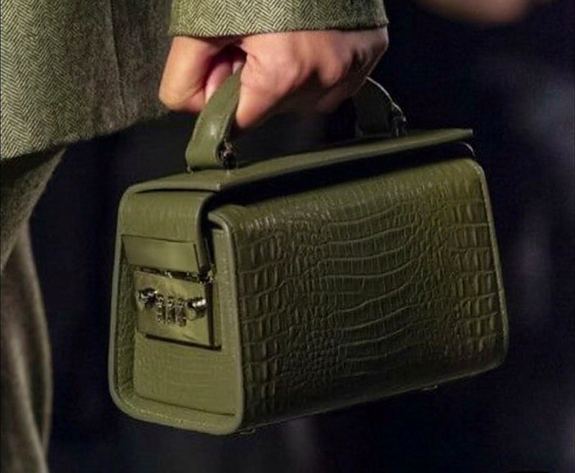 Verdant Mini Trunk in embossed cactus croco, carried by hand